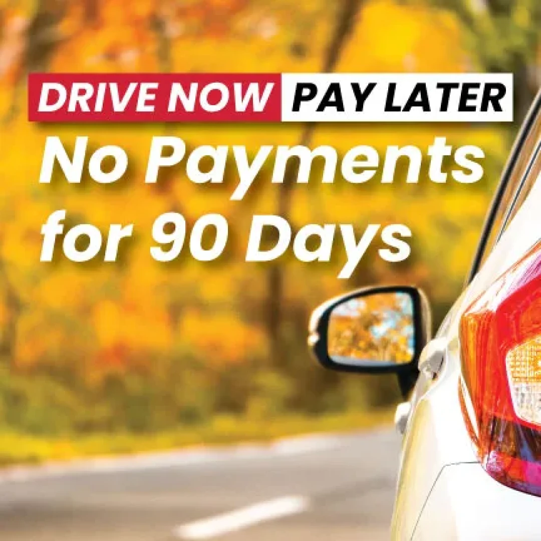 Bank Local. Drive Now Pay Later. No Payments for 90 Days. A car driving in the fall foliage. 